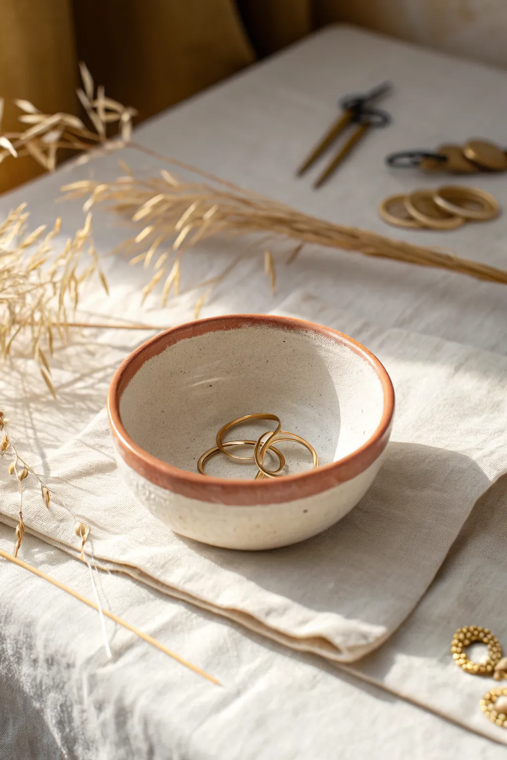 Beginner-friendly pinch pot bowl with a painted rim, perfect for holding rings and small finds.