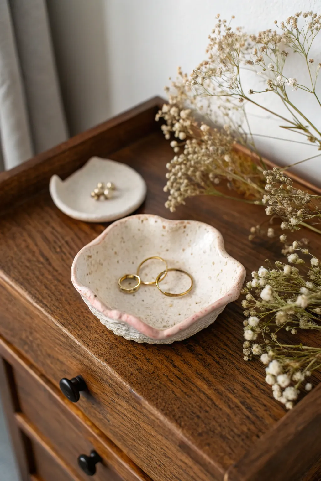 Organic air-dry clay trinket dish in blush, perfect for rings, studs, and bedside calm.