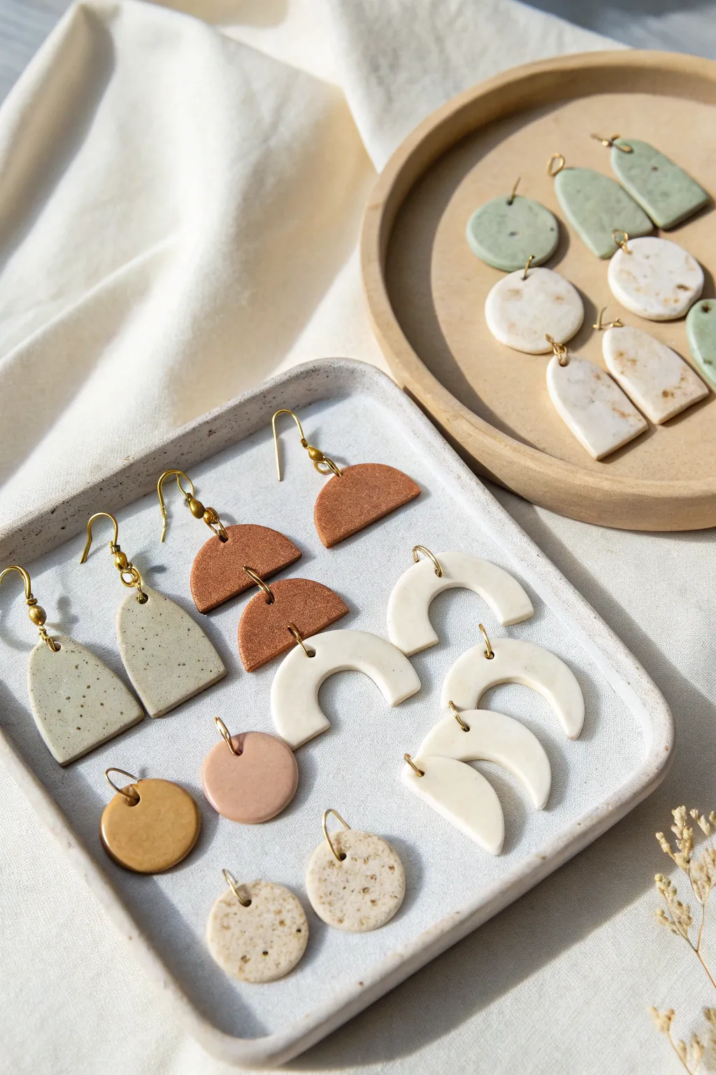 Batchable air dry clay earrings in modern shapes with a soft Scandinavian boho palette