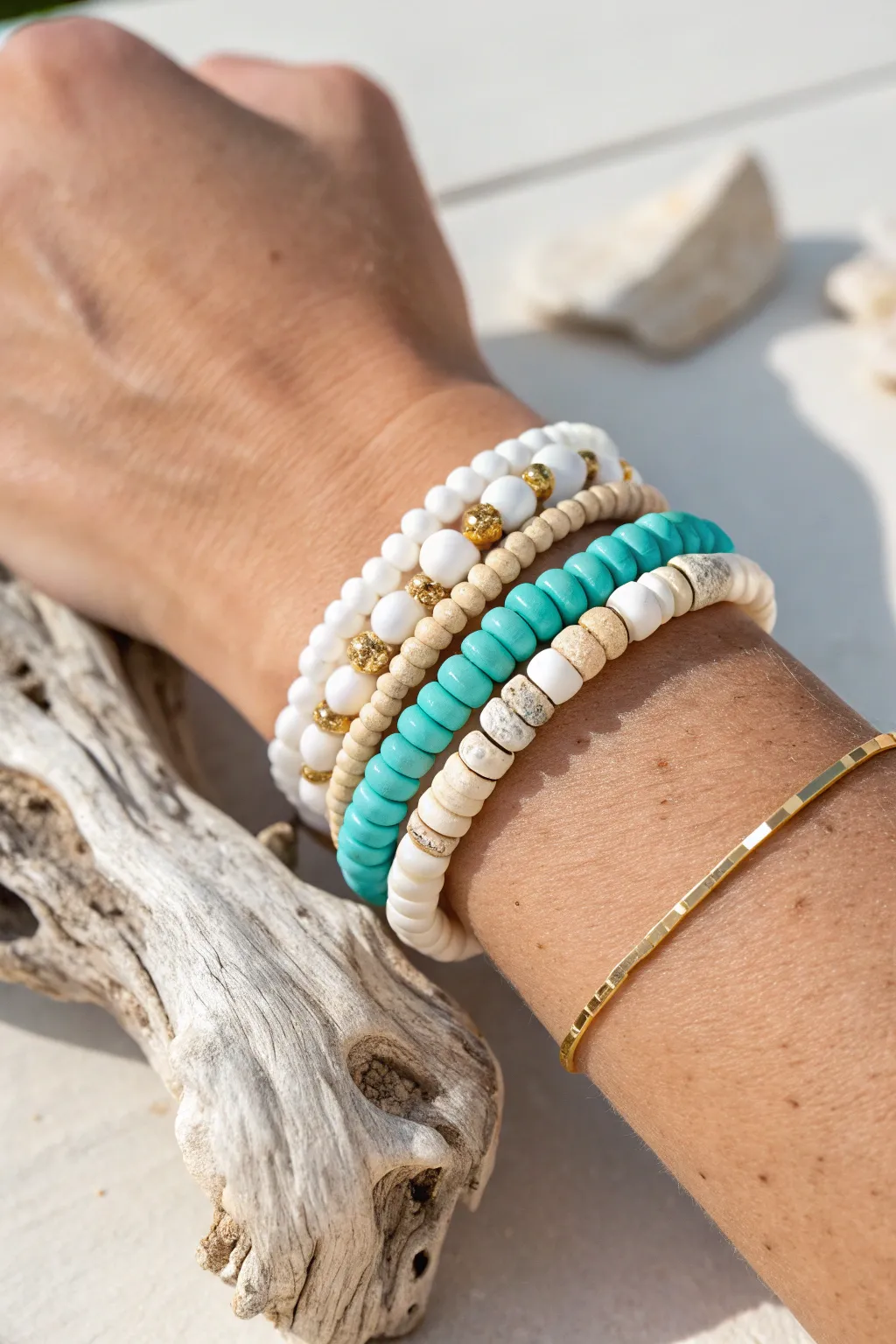 Classic beach stack: turquoise, white, and sand heishi beads for an effortless coastal vibe.