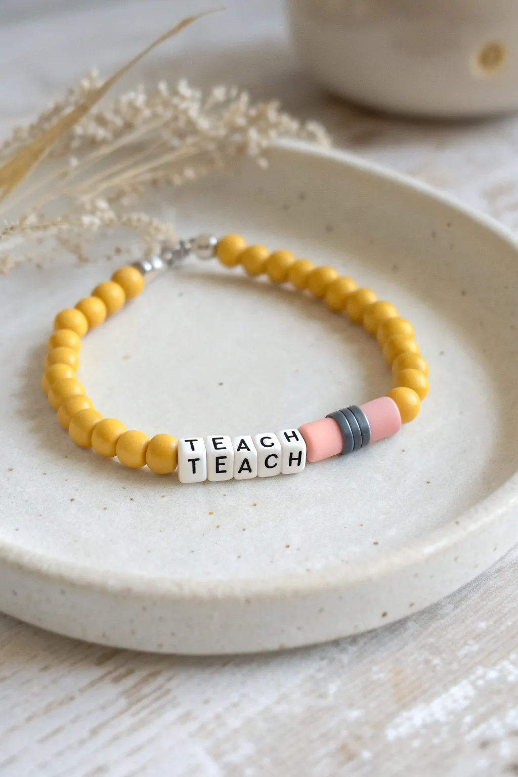Classic pencil-inspired clay heishi bracelet with TEACH beads, perfect handmade gift for teachers