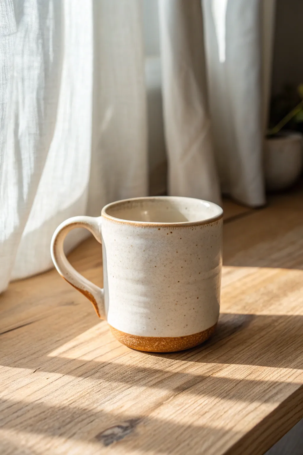 Timeless pulled-handle C-curve mug with satin glaze and clean joins, made for two fingers
