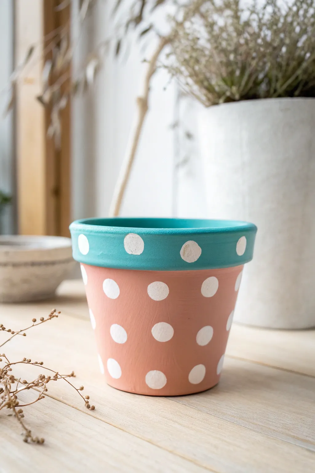 Bold polka dots and a bright rim turn a simple pot into a cheerful, kid-friendly classic.