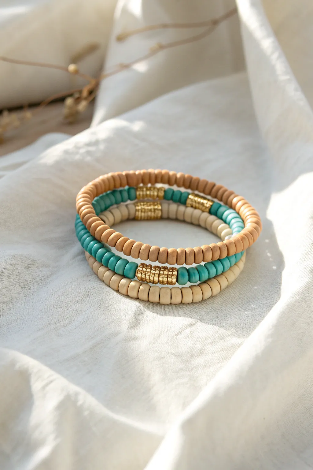 Classic cowgirl heishi stack in turquoise, sand, and tan with subtle gold spacers