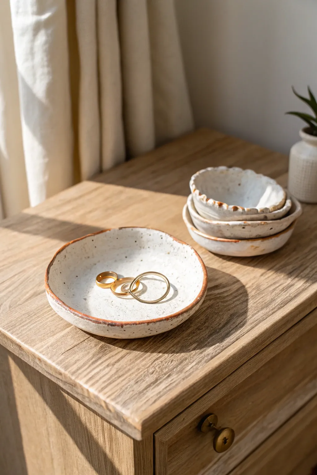 Minimal air-dry clay trinket dishes with speckles and stripes, perfect for rings and pins