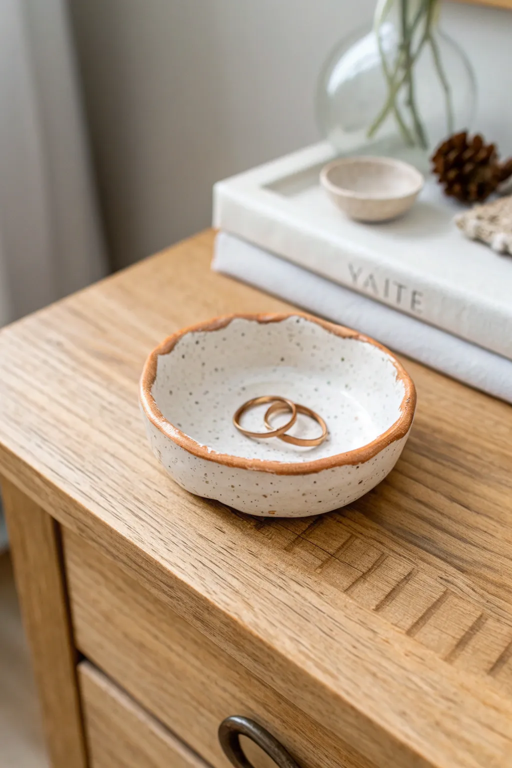Minimal pinch-pot trinket dish with painted rim, perfect for rings and hair pins.