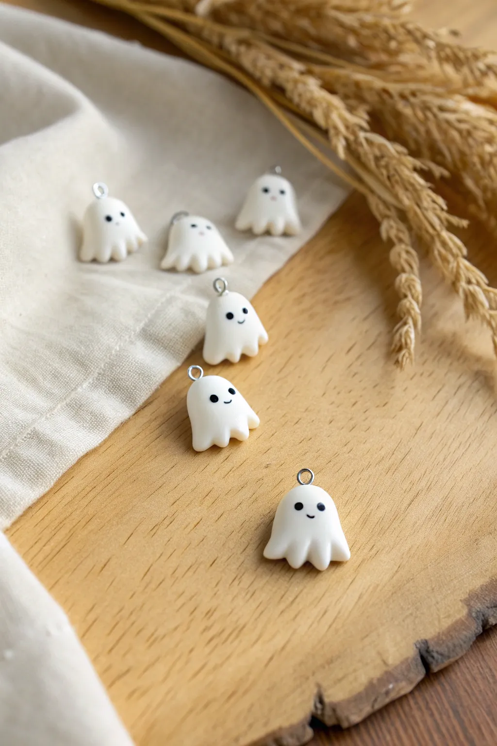 Chubby little ghost charms that are easy to make, perfect for a minimalist Halloween touch.