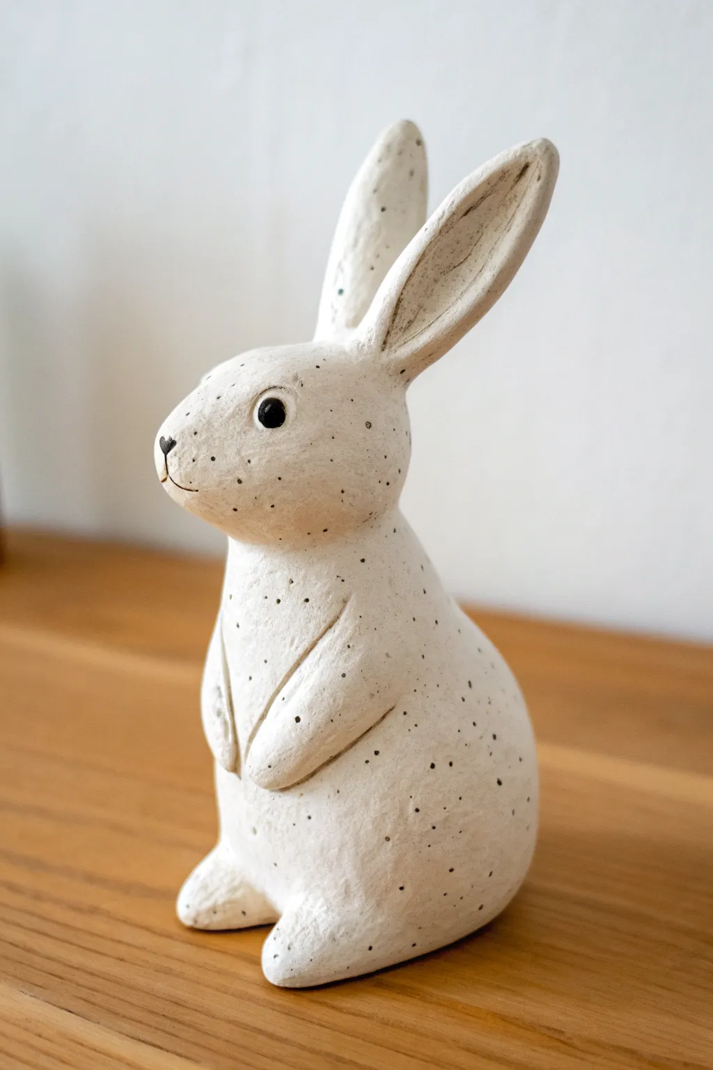 Sweet pinch pot bunny in matte white clay, a minimalist sculpture idea you can make in one sitting.