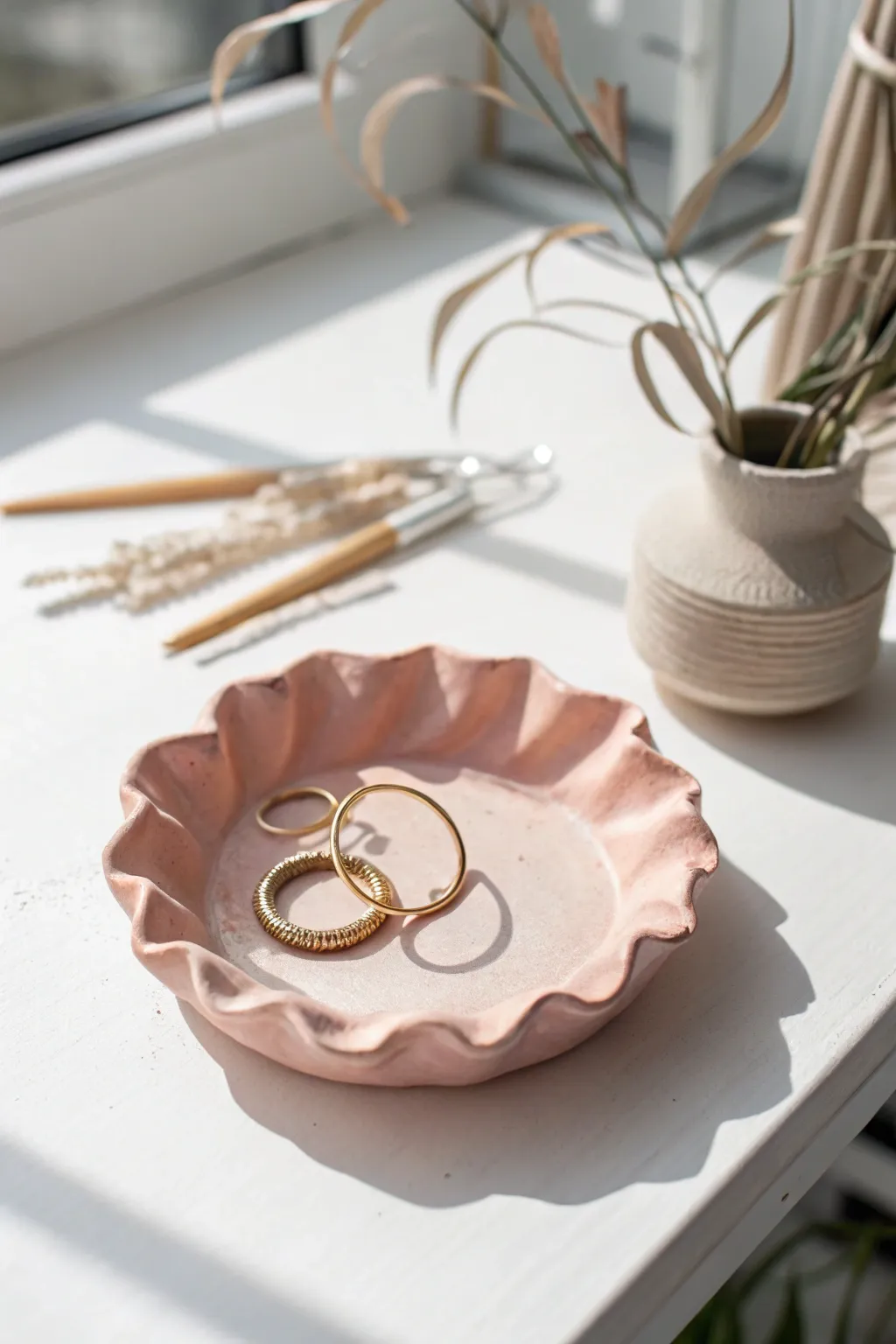 Soft pastel wavy-edge trinket dish for rings and pins, minimalist and boho on bright white.