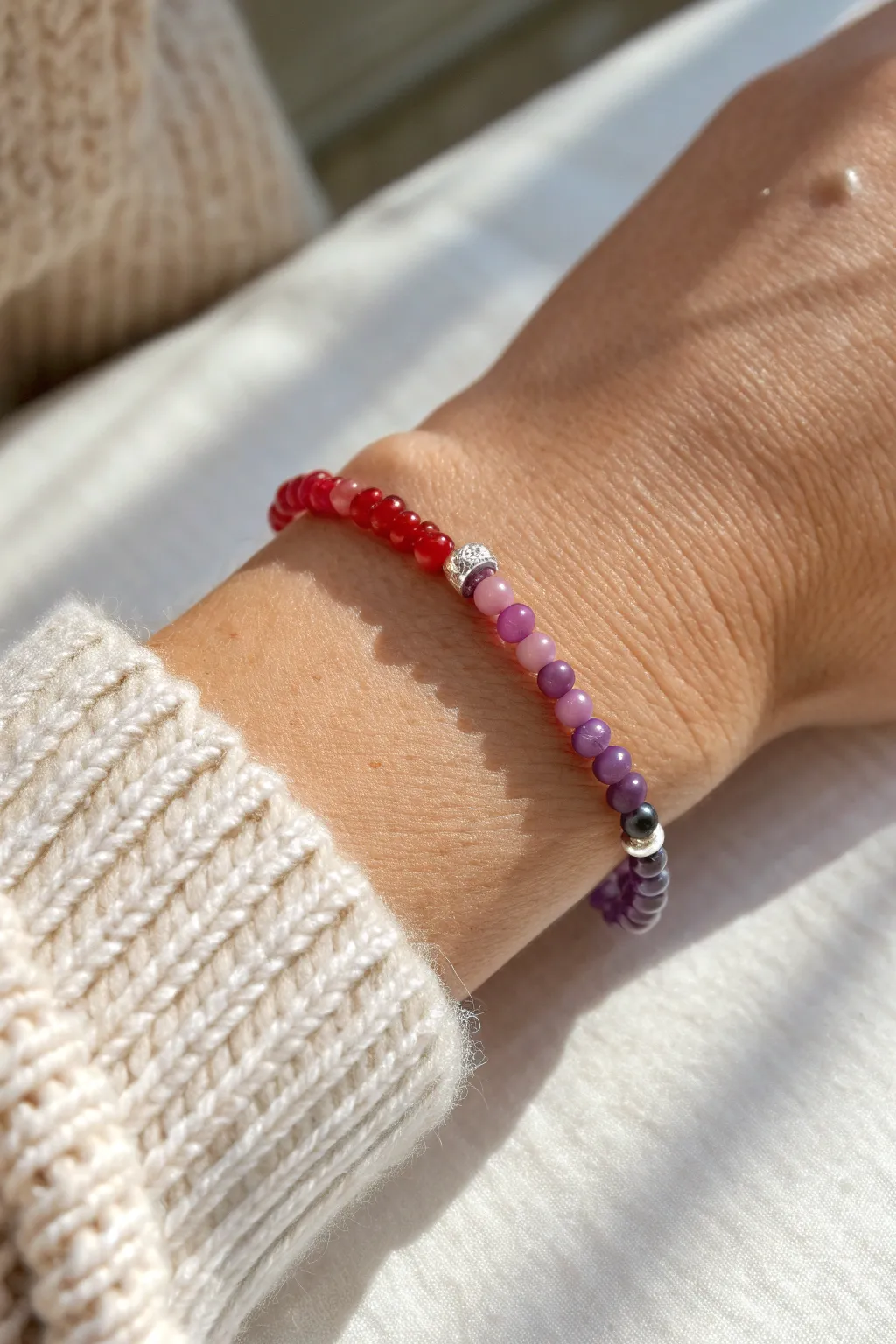 Classic rainbow heishi bracelet with subtle metal spacers, minimalist boho sparkle on wrist