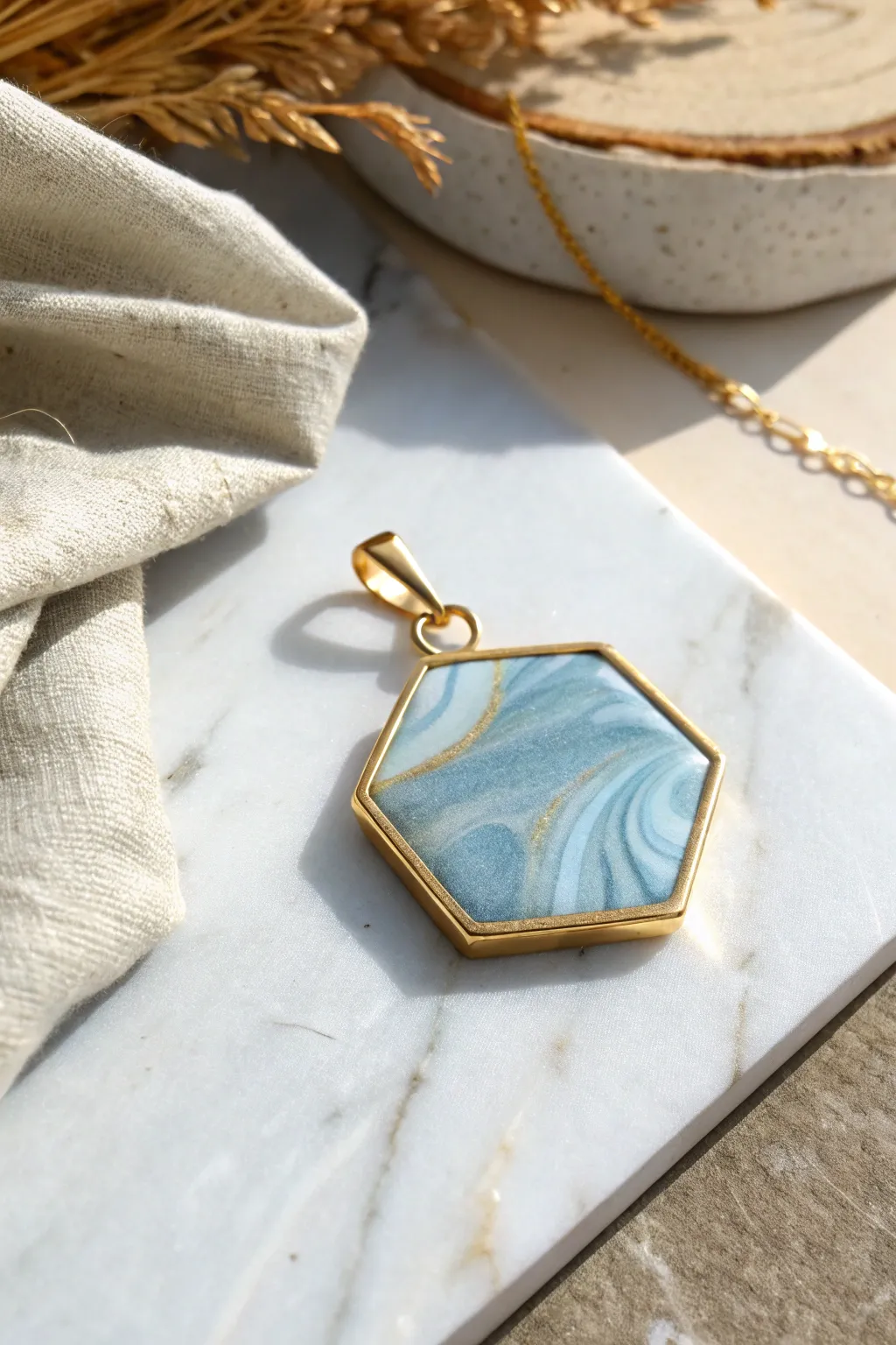 Minimal faux resin bezel pendant in liquid polymer clay, ocean tints, handcrafted glow