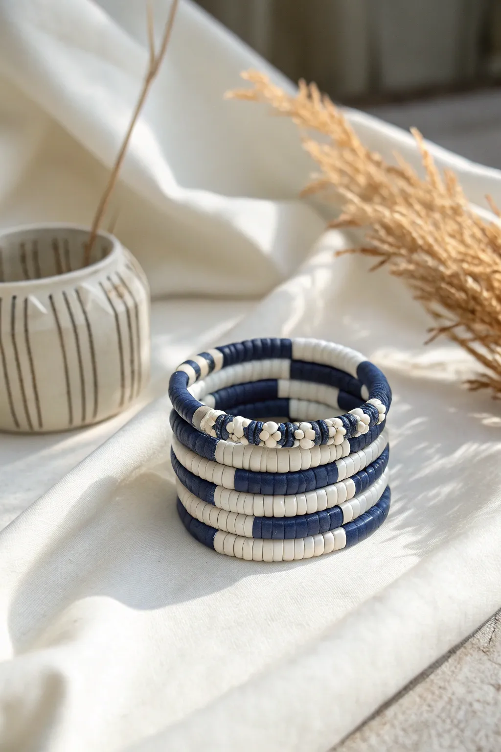 Classic navy and white clay heishi bracelet stack for a crisp preppy look with boho calm