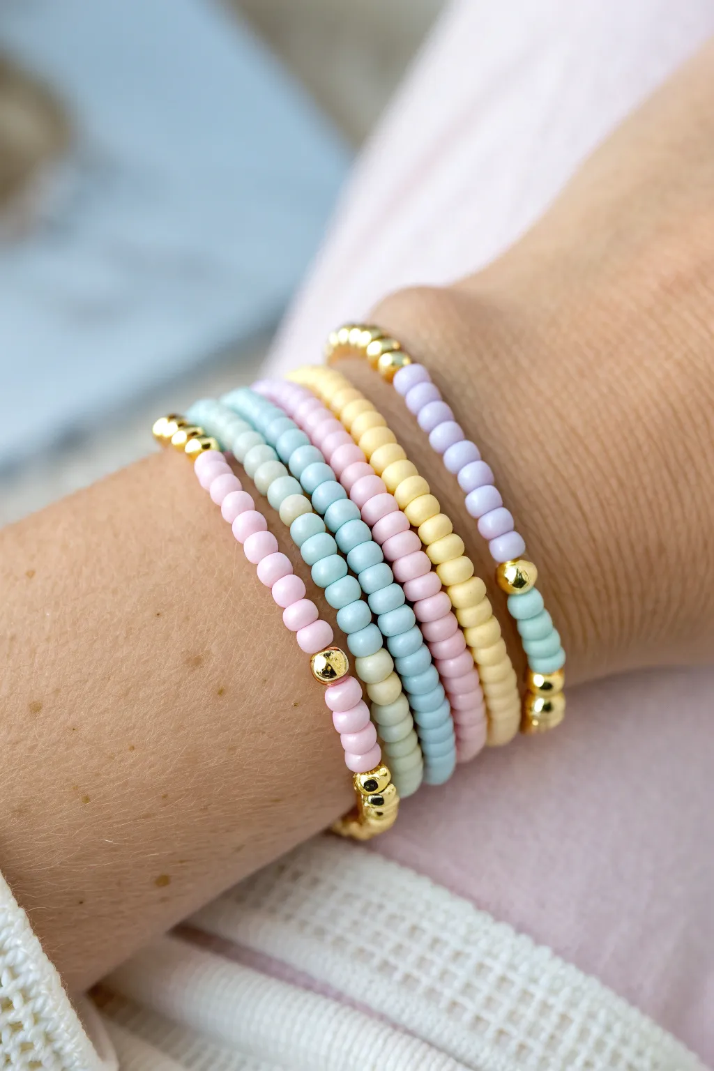 Classic pastel rainbow heishi stack with tiny gold spacers for an easy preppy look.