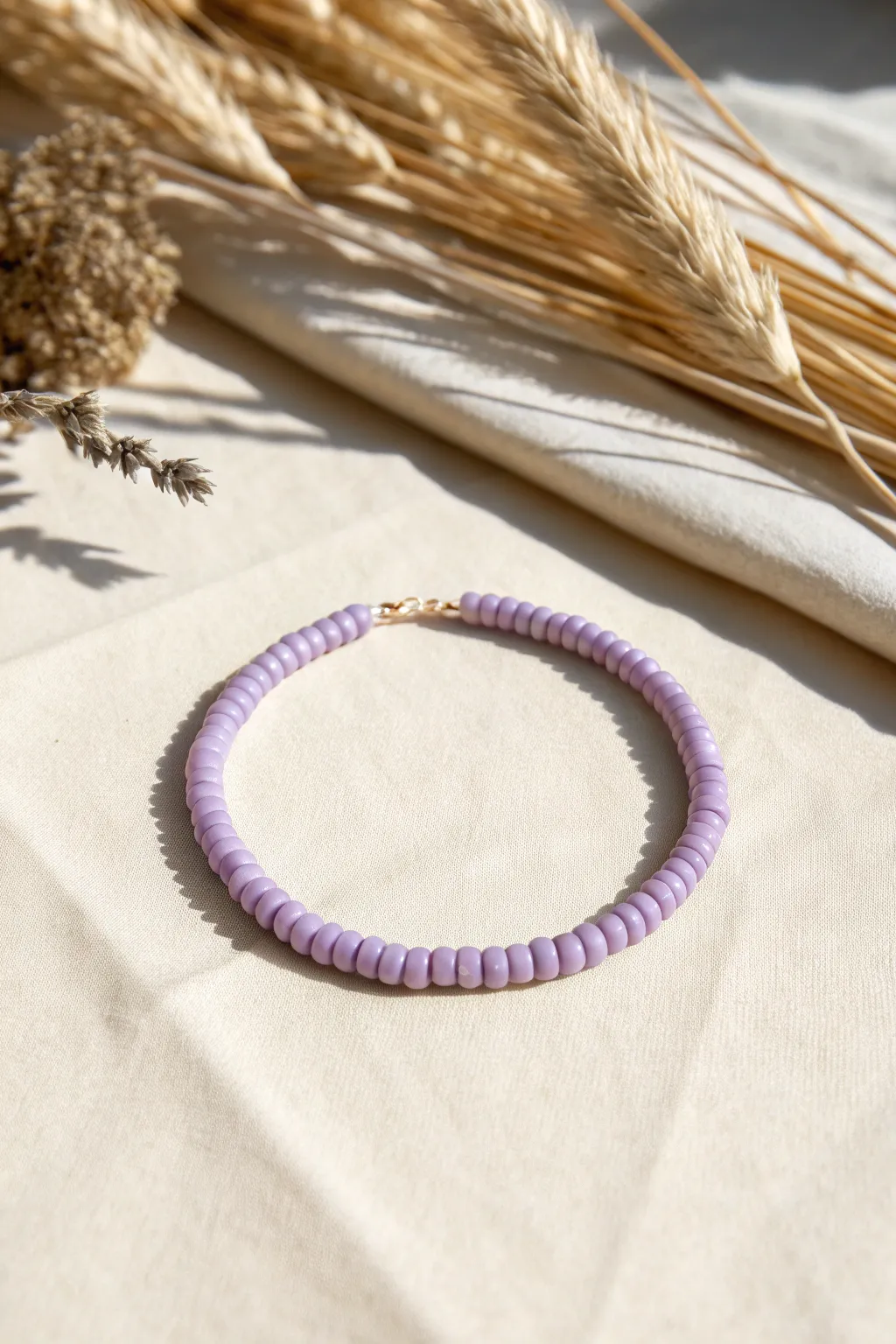 Solid lavender heishi bracelet: minimalist, boho-soft, and easy to wear every day.