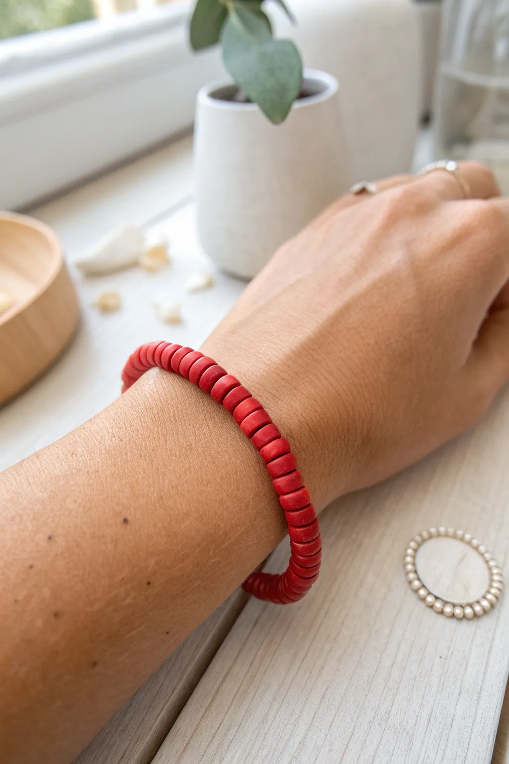 Solid red heishi bracelet inspiration, minimalist and handmade, perfect pop of color.