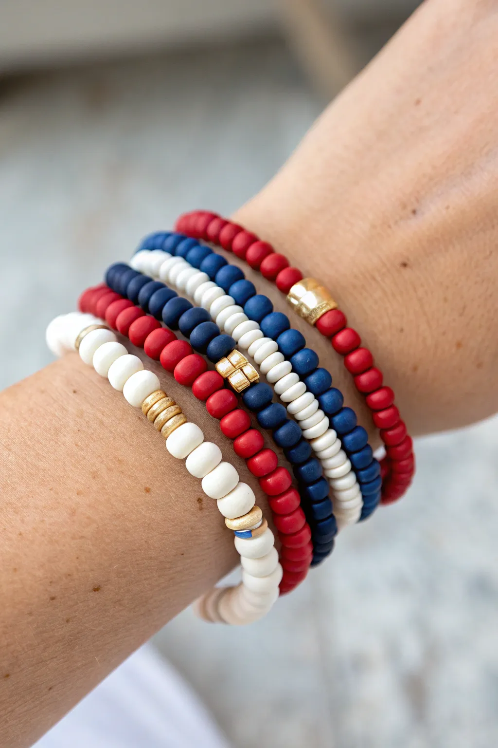 Classic red, white, and blue clay bead bracelet stack for an effortless 4th of July look.