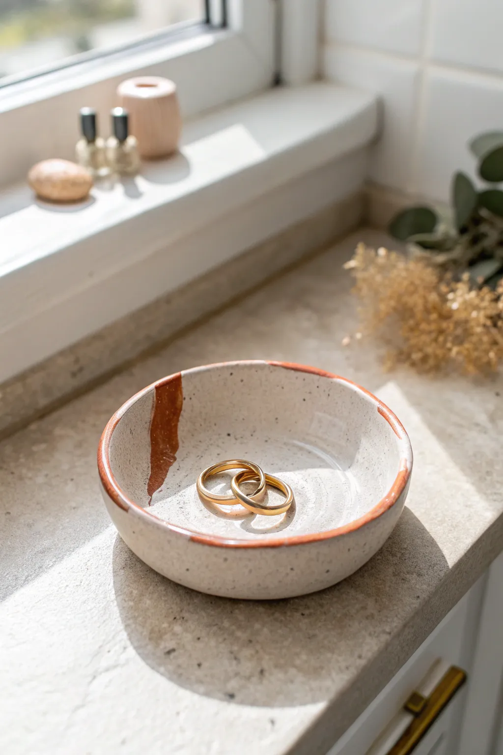 Minimal clay ring dish keeps everyday jewelry safe and beautiful on your vanity.