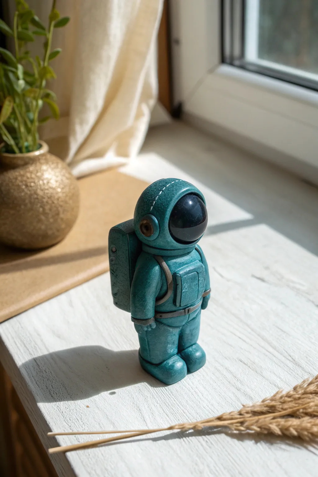 DIY clay space crewmate figurine with a glossy visor, styled minimal and cozy for gamer decor