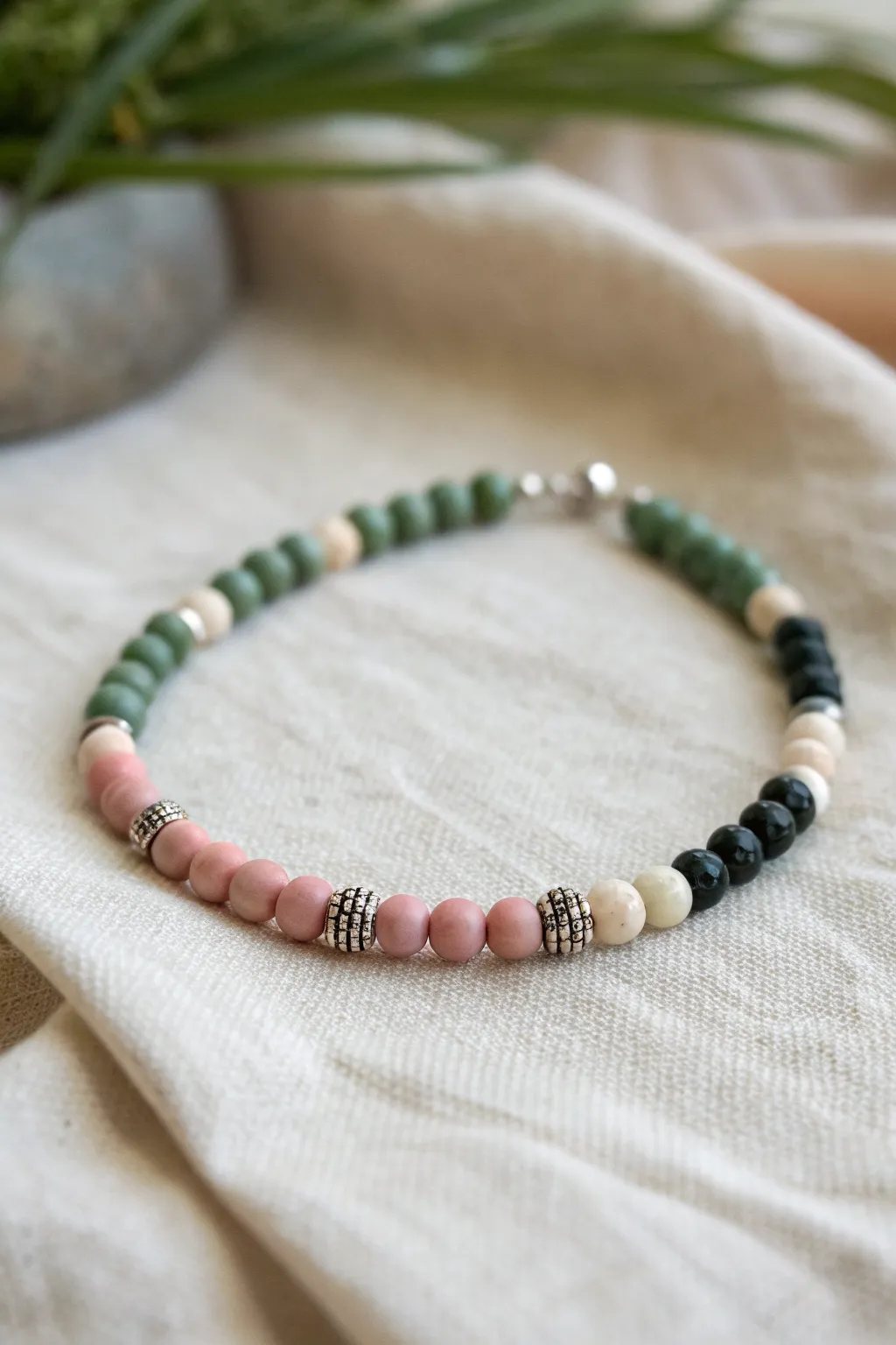 Classic split heishi bracelet: blush and ivory meets sage and charcoal with a tiny silver spacer.
