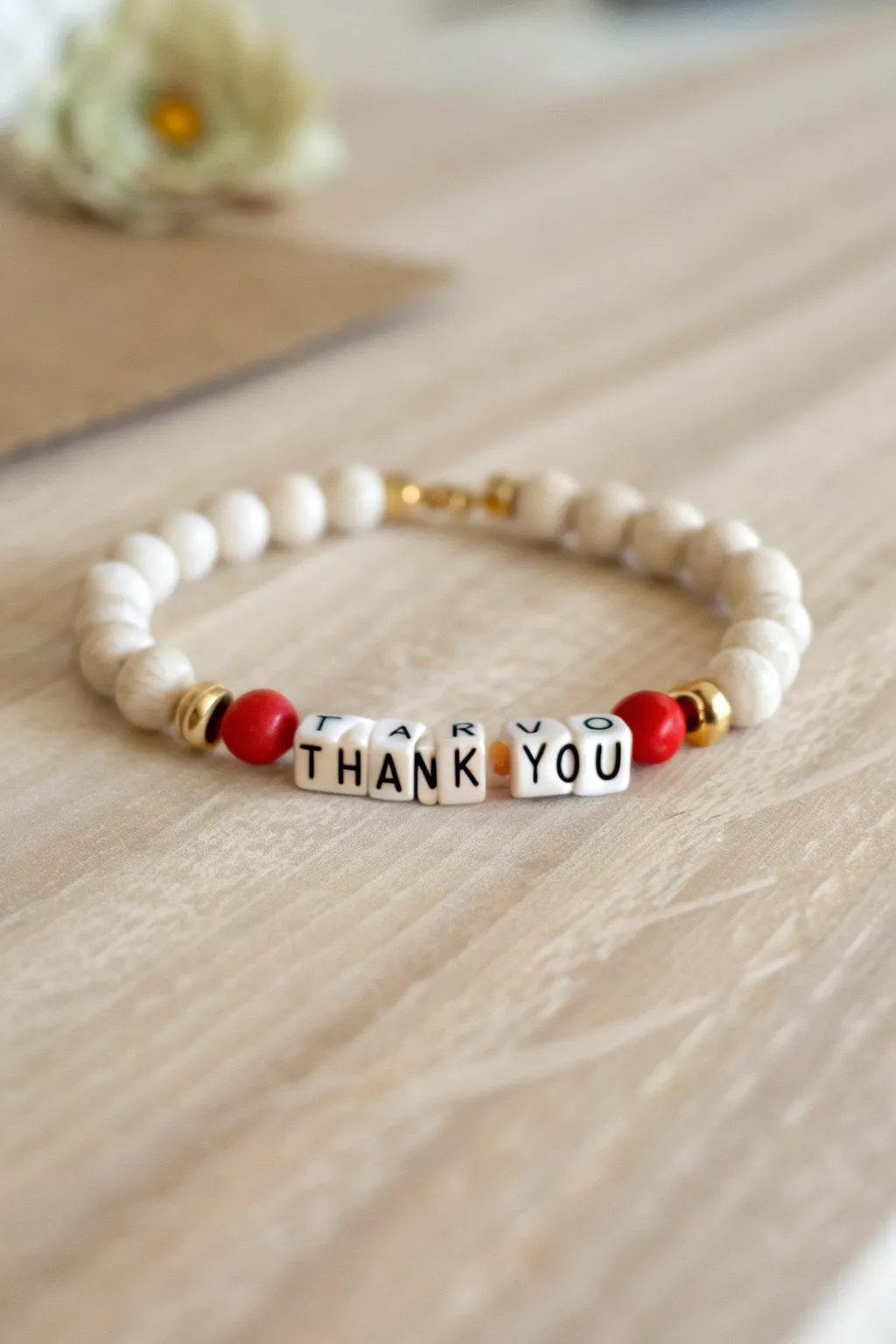 Heart-studded thank you clay bead bracelet, a minimalist handmade gift idea for teachers