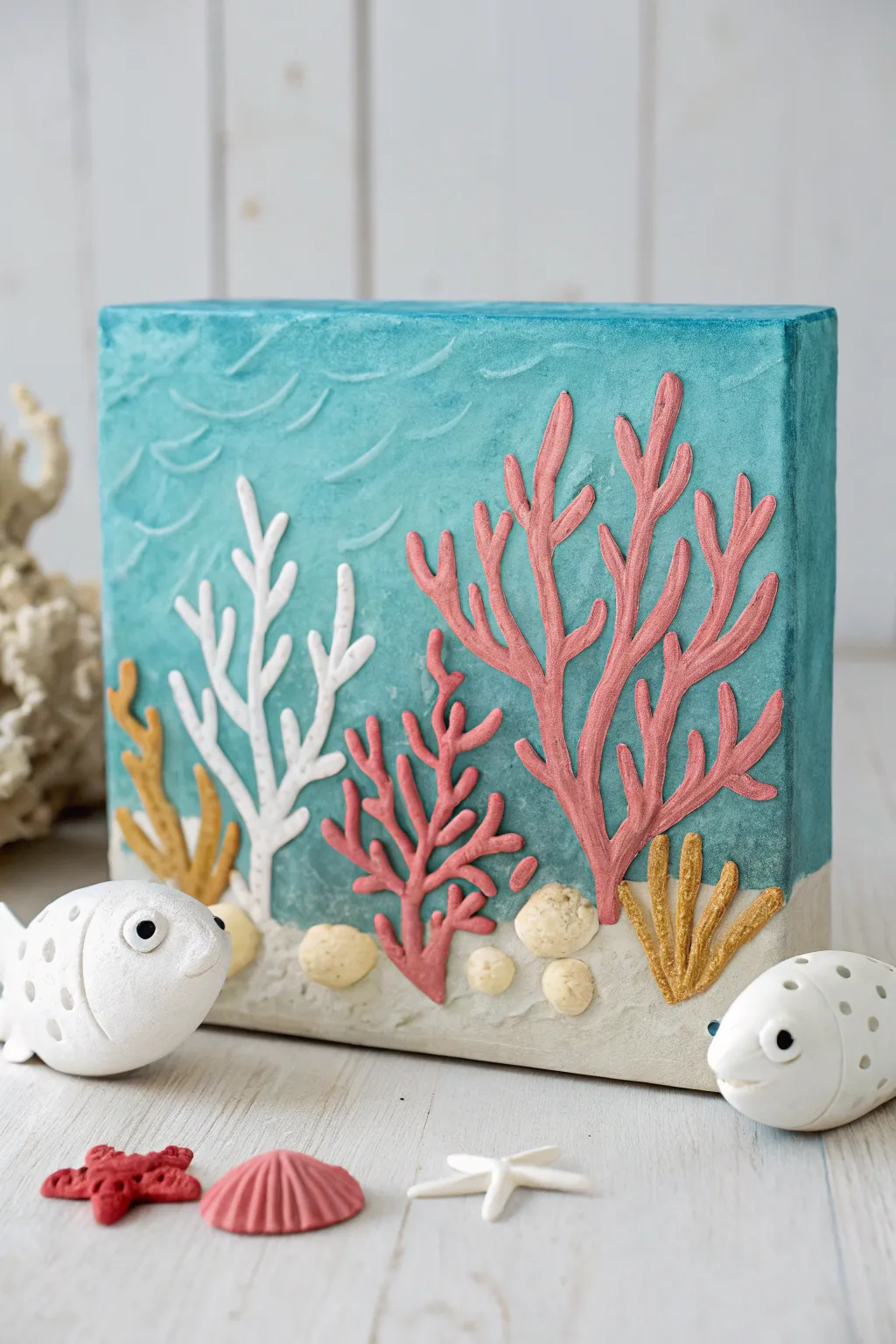 Underwater coral garden on canvas with raised clay details and bright pops of color