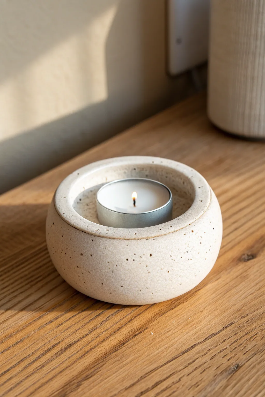 Simple hand built tea light holder with recessed seat, perfect beginner pottery project.