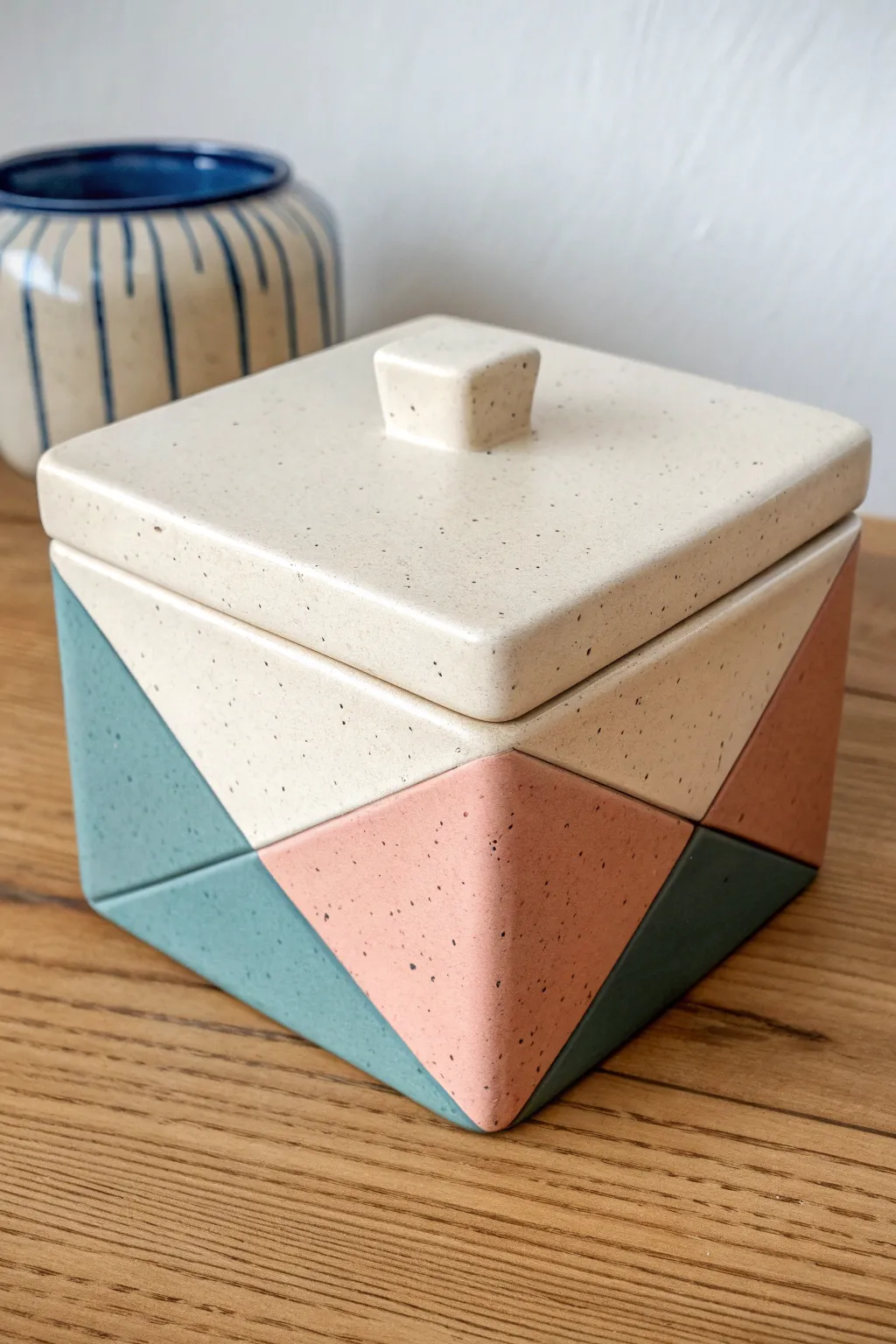 Color-blocked slab box with crisp masked edges, minimalist boho styling and bright contrast.