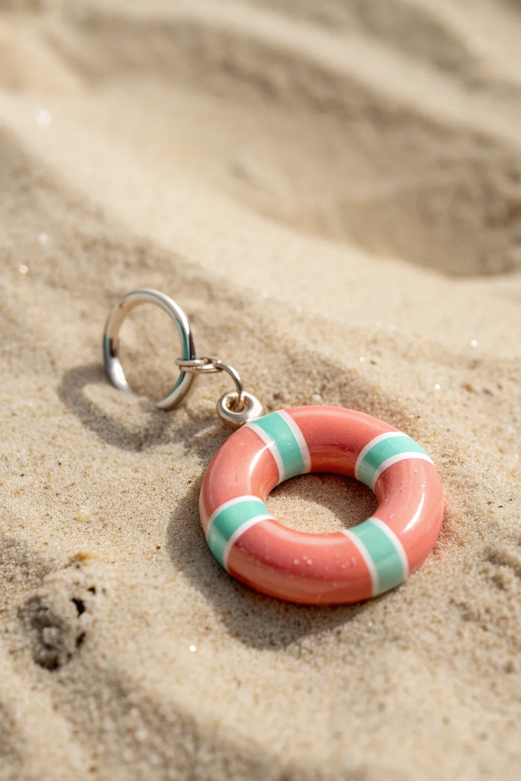 Glossy pool-float donut charm in pastel summer tones, minimalist styling for sunny clay ideas