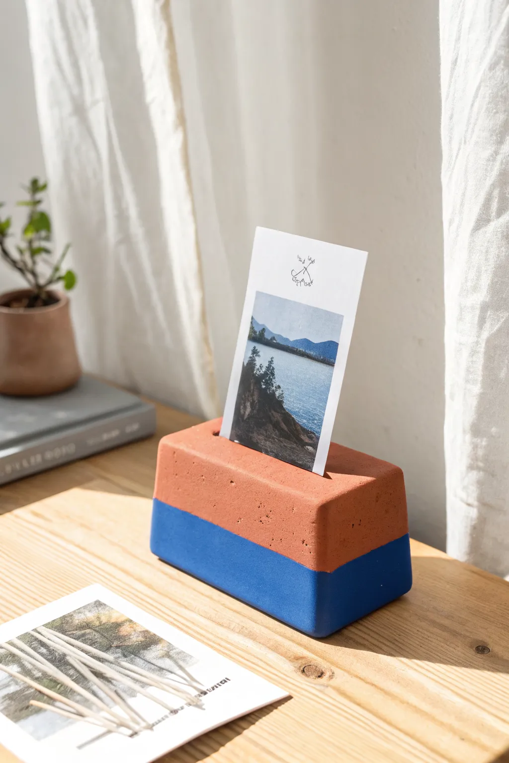 Easy air dry clay photo and card stand with bold color dip, perfect for a minimalist desk.