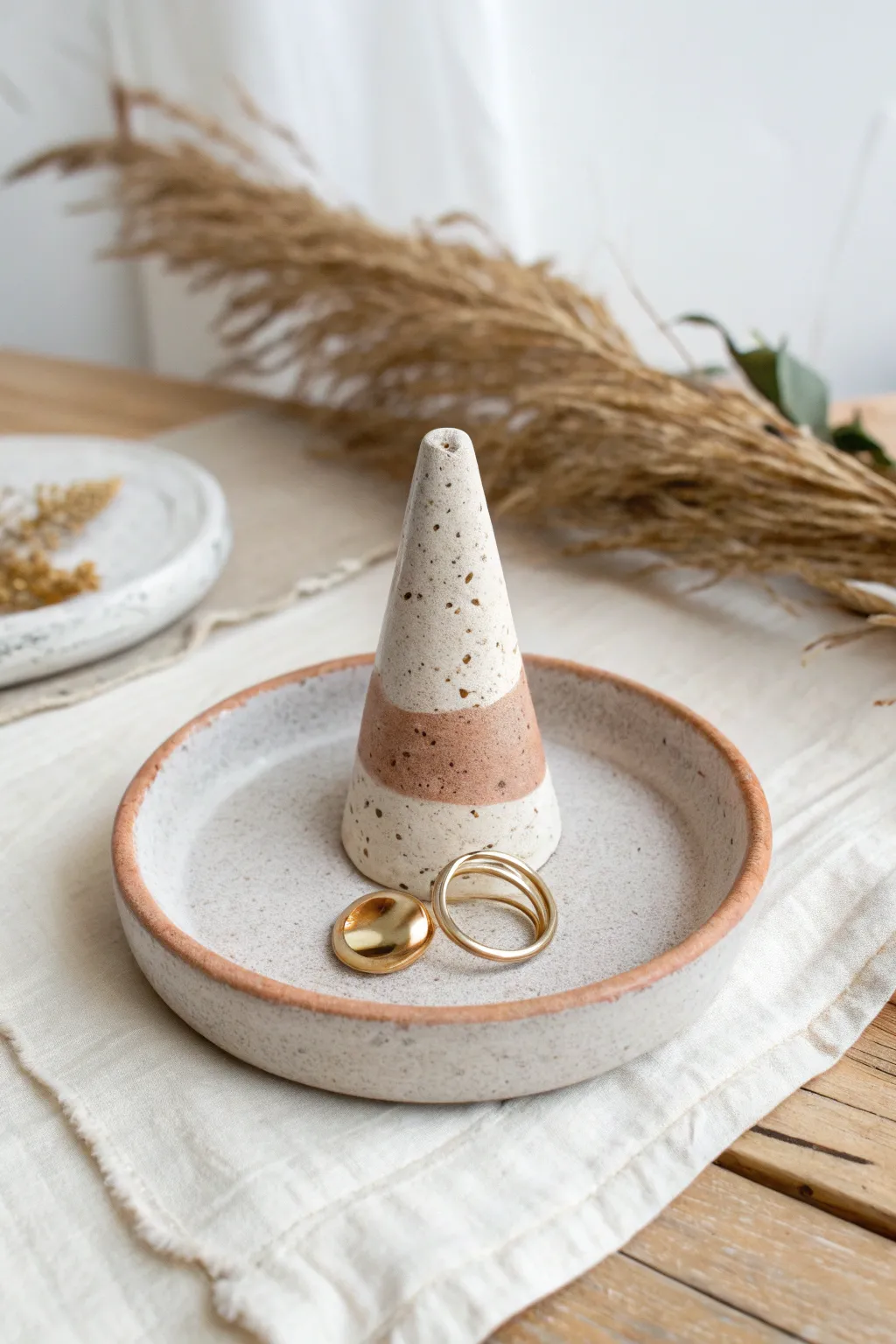 Cozy at home pottery date night: air dry clay ring cone and jewelry dish duo in bold terracotta
