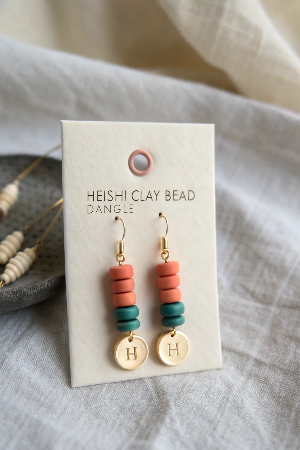 Minimal boho clay bead dangles with a sweet personalized initial, bold color, and gift-ready style.