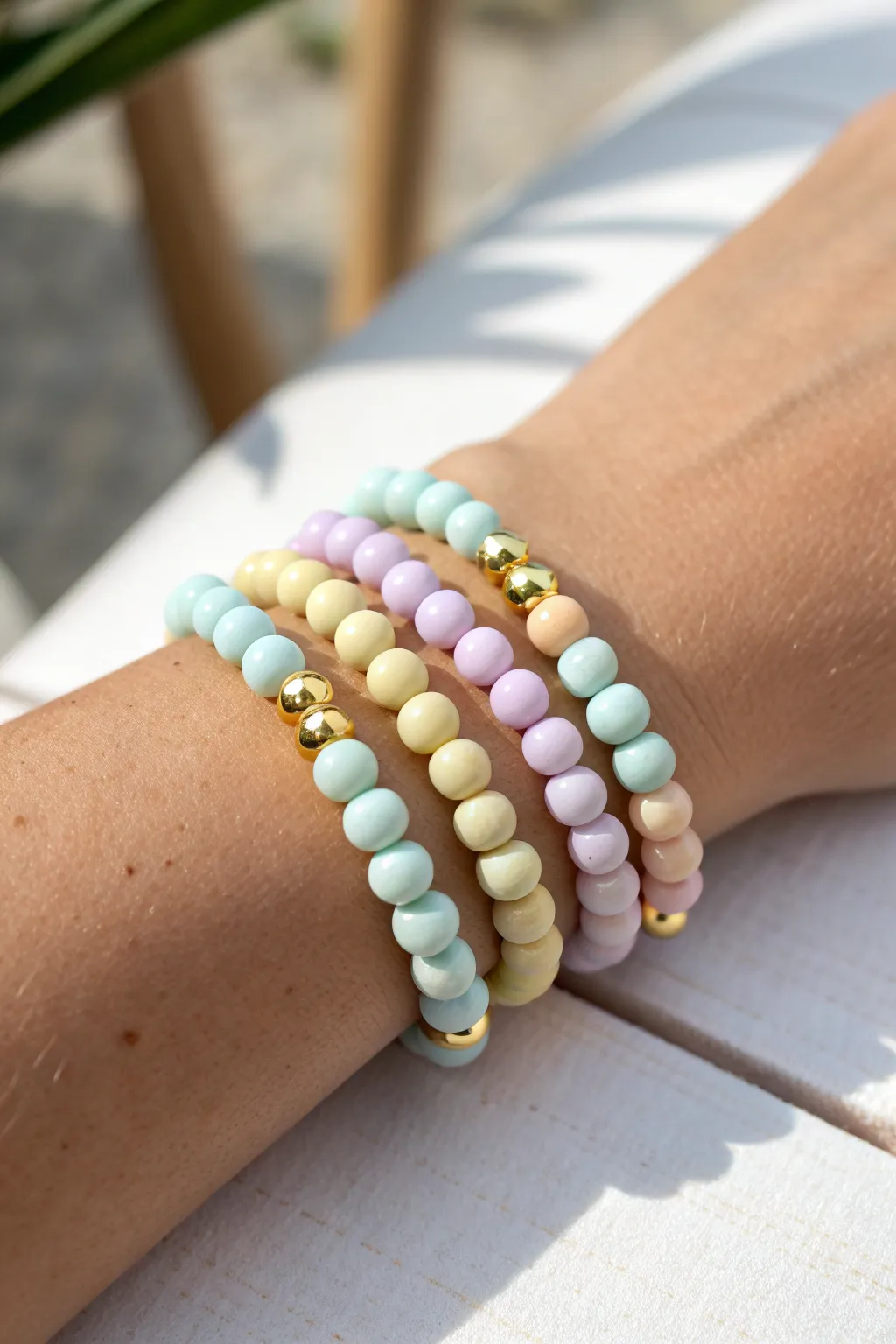 Pastel preppy clay bead bracelet stack with gold spacers for a bright, clean, coordinated look
