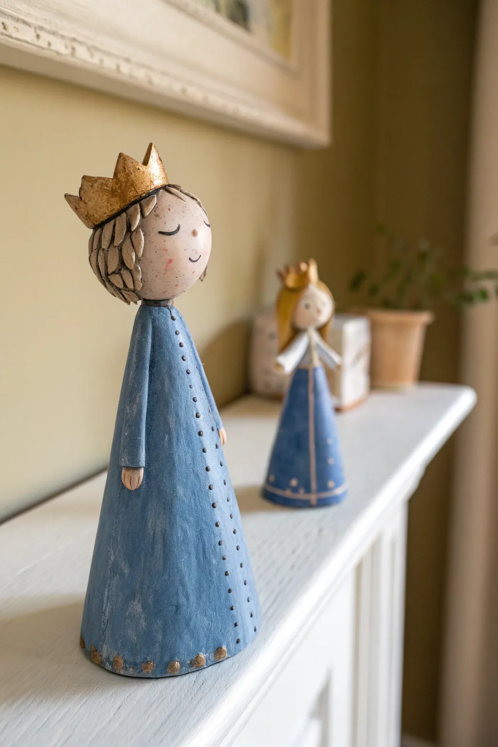 Princess-style clay figurine idea: simple gown and tiny crown, minimalist shelf with boho warmth
