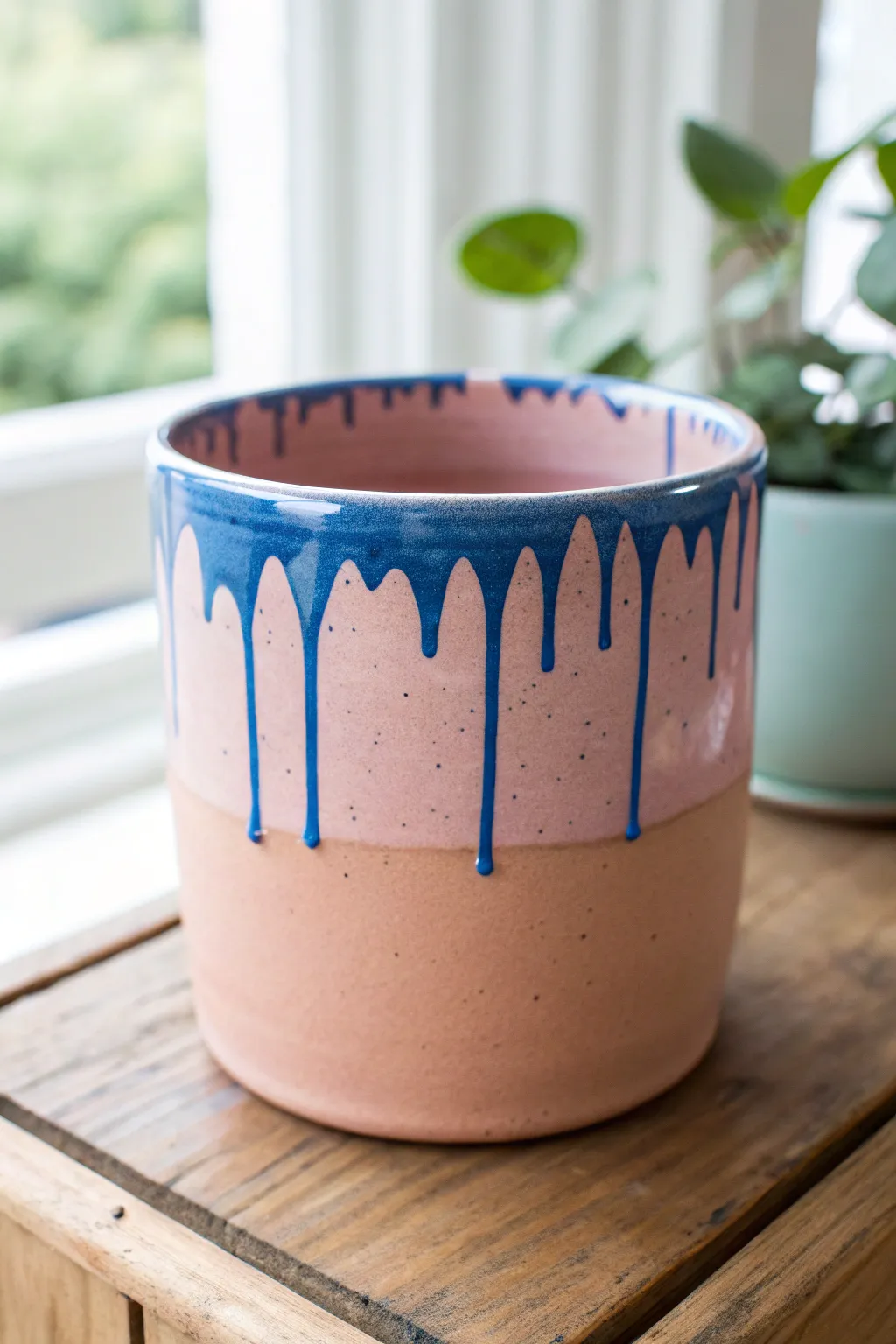 Bold drippy glaze over a matte base for an easy, modern pot color idea with wow factor.