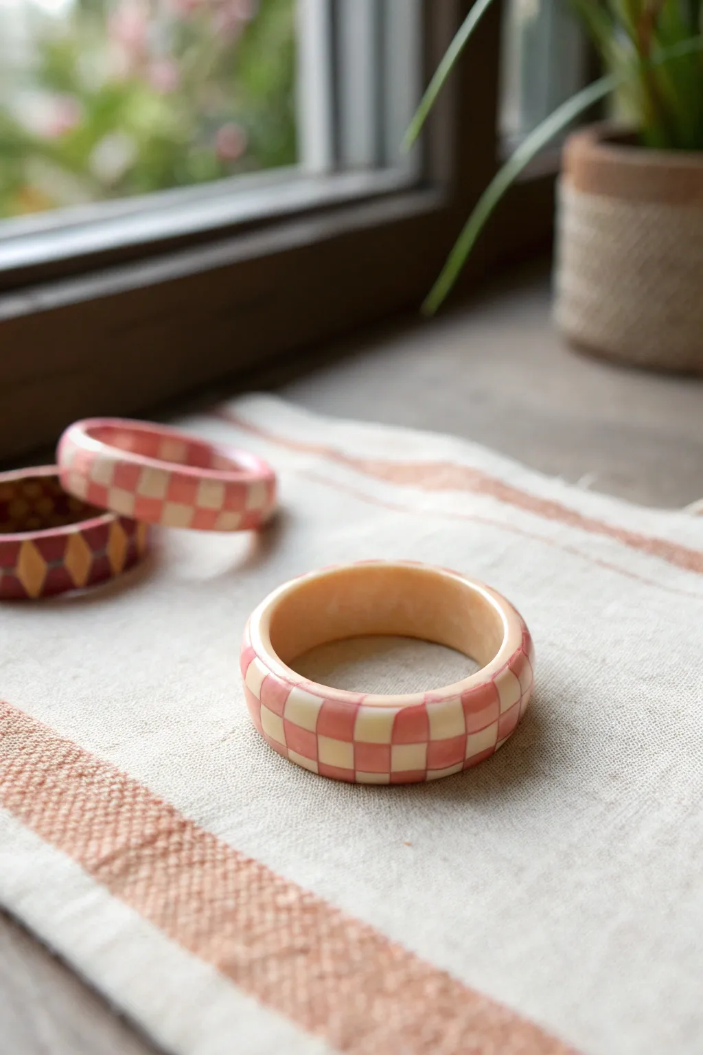 Pastel checkerboard clay ring that pairs beautifully with your favorite mix-and-match bands.