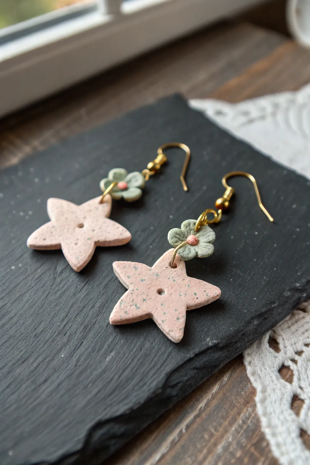 Mini star and flower air dry clay earrings in soft pastels, simple handmade charm and texture