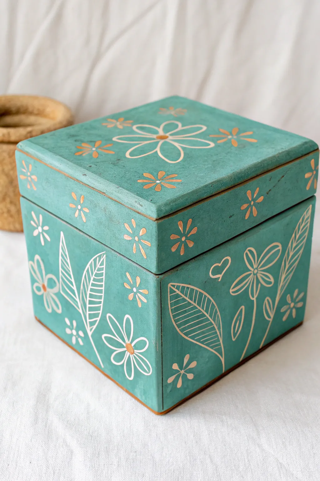 Playful sgraffito doodles turn a simple slab box into a bright, modern keepsake.