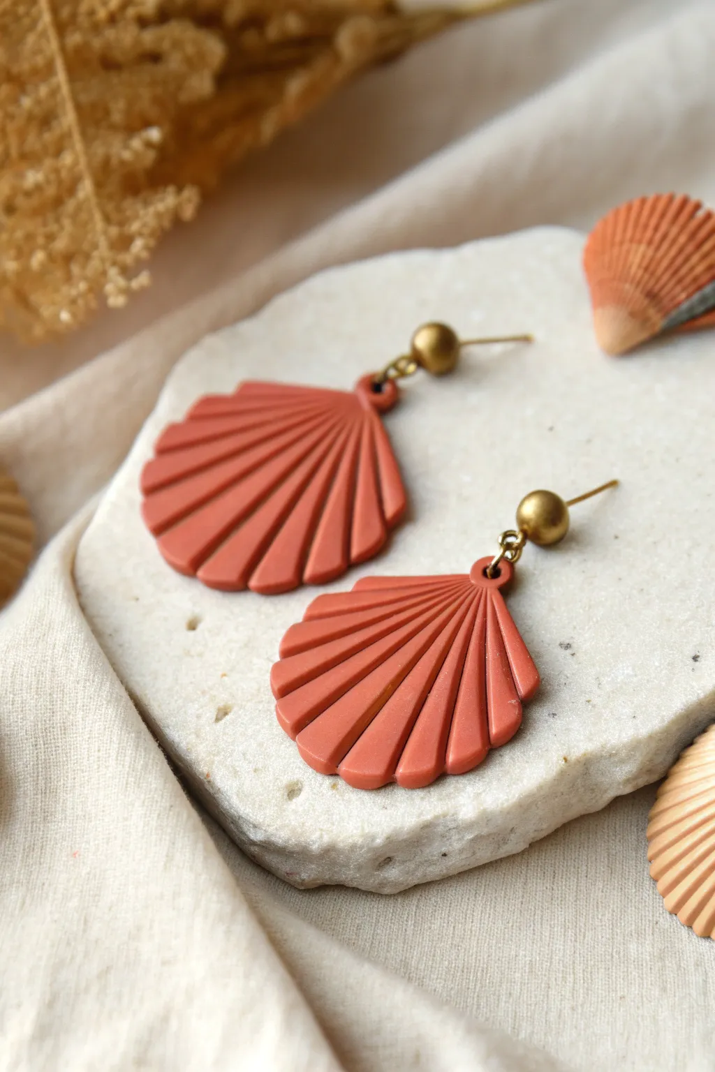 Ruffled scallop polymer clay dangles in bold coral and brass, simple enough for beginners
