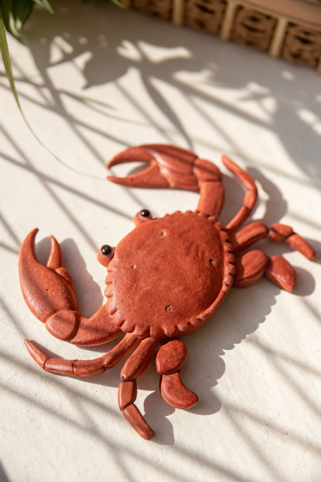 Make this cute red clay crab magnet: simple shapes, bold color, perfect for beginners.