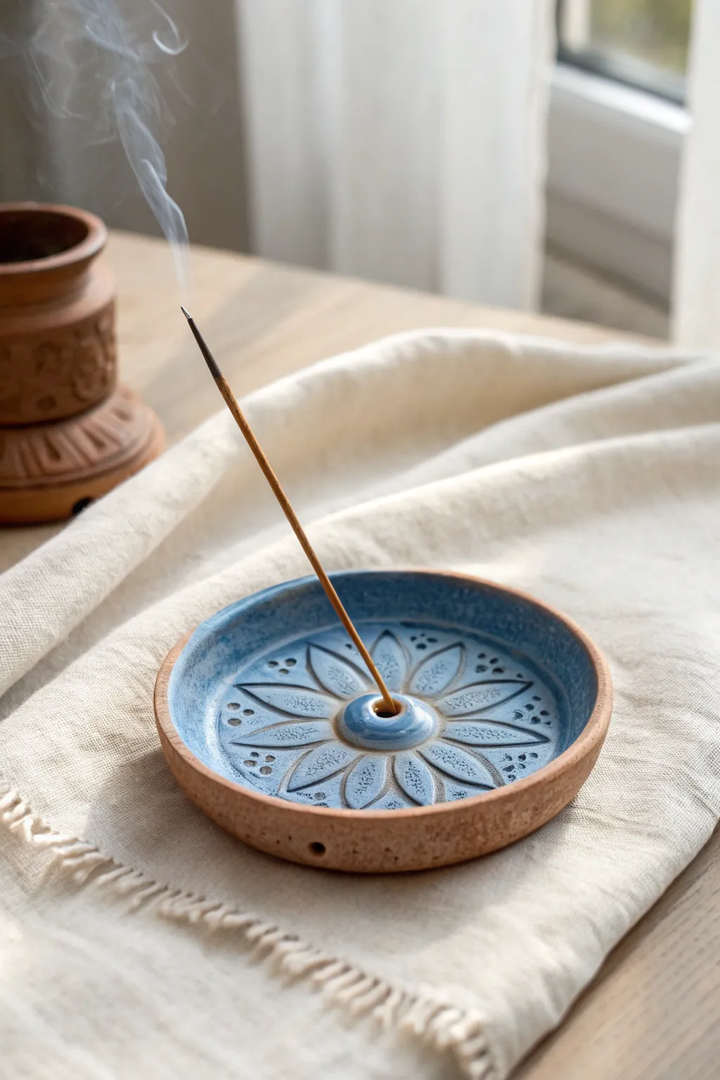Beginner friendly incense holder dish with a center hole, minimal carving, bold color, calm styling.