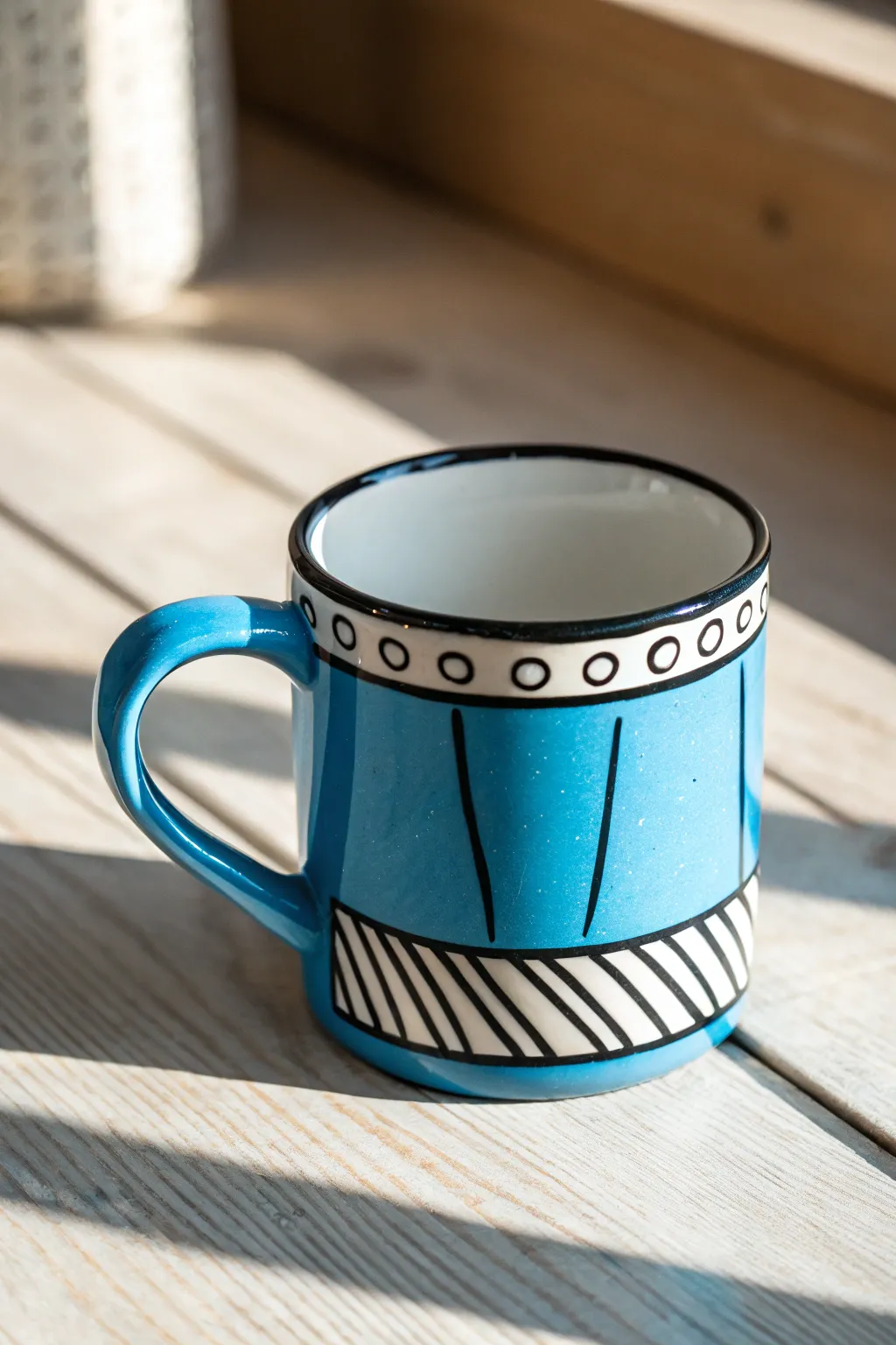 Cartoon outline mug in pop art clay style, bold black lines and bright color, minimalist vibe.