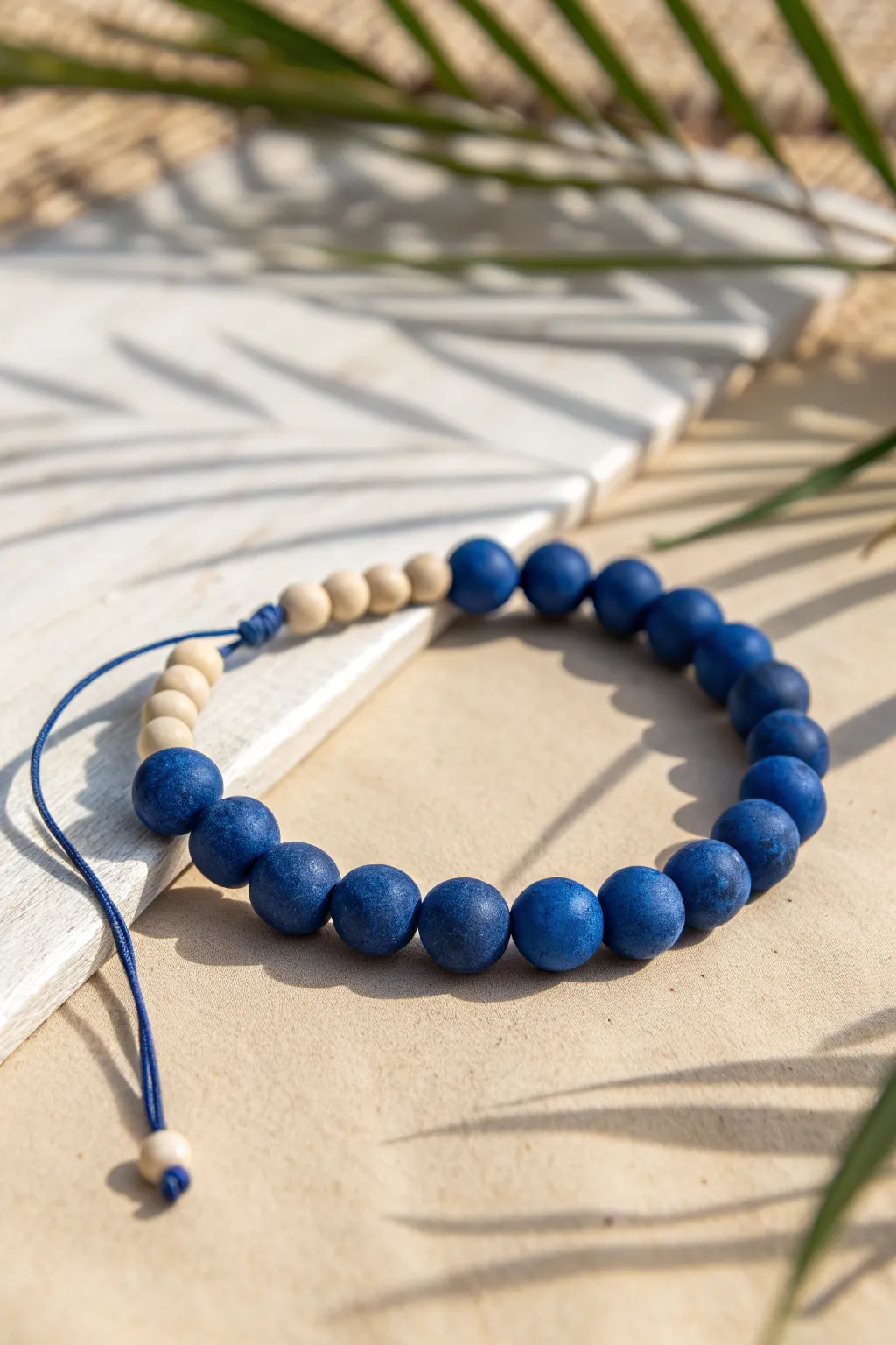 Monochrome cobalt bracelet with a matte and glossy bead mix for crisp, modern texture.