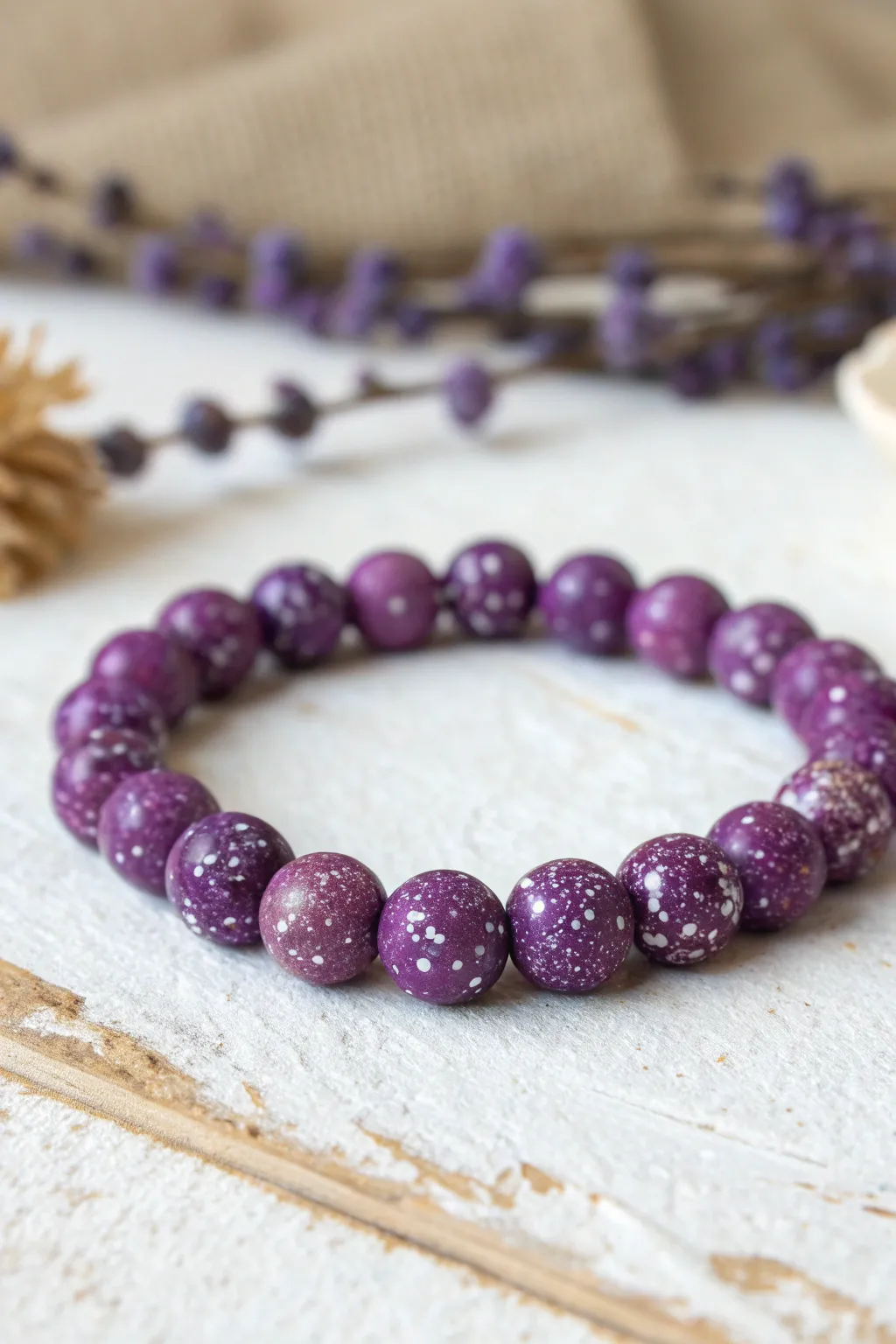 Speckled terrazzo purple bead bracelet with clean Scandinavian styling and cozy boho charm.