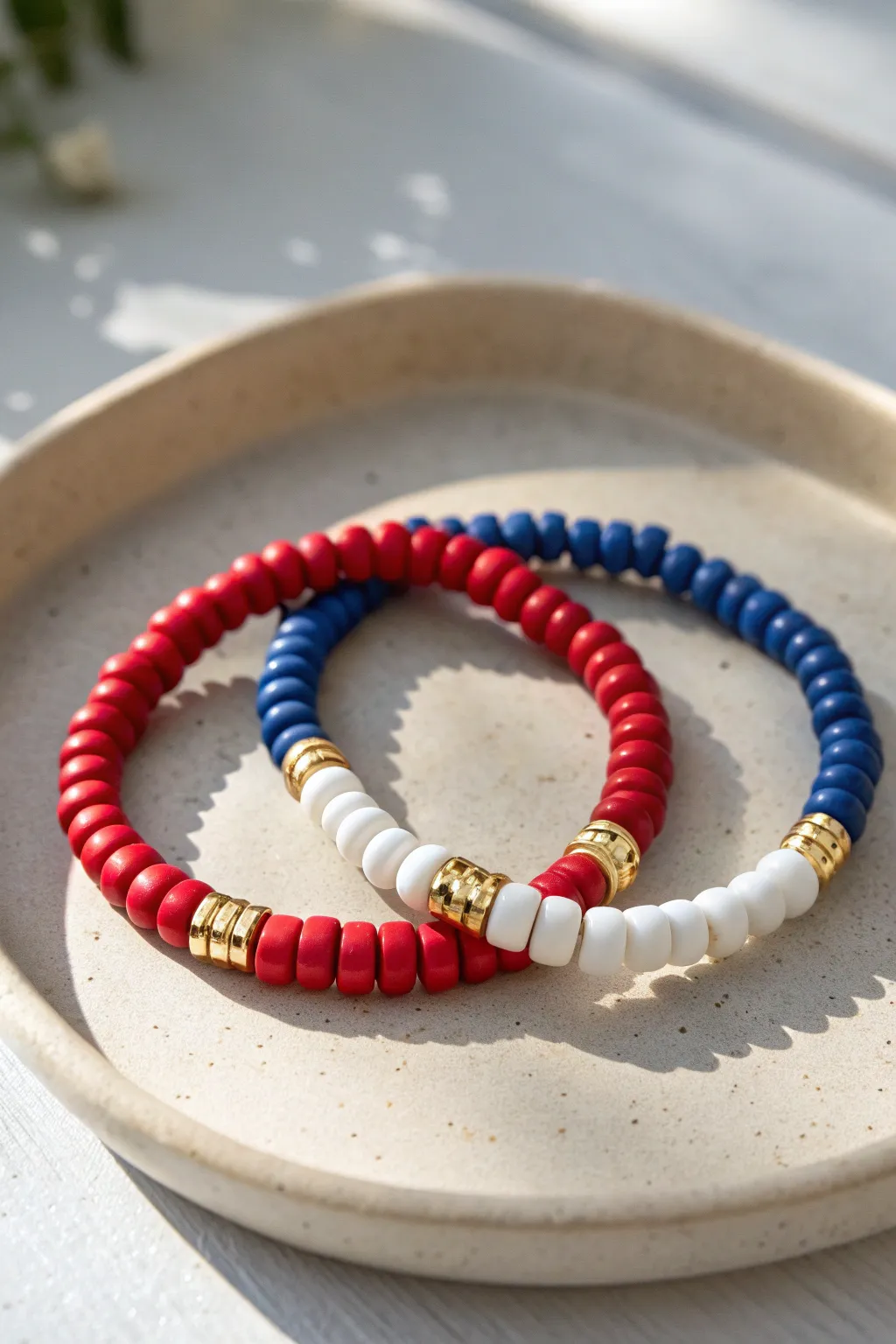 Red-white and blue-white checker sequences for an easy Fourth of July clay bead bracelet duo