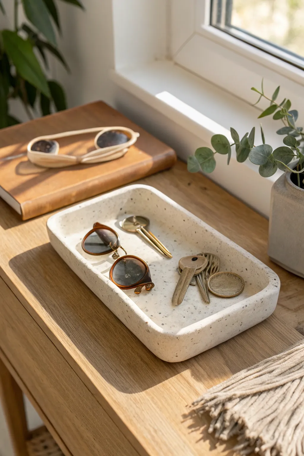Minimal air dry clay key tray with a raised lip, styled for a calm Scandinavian entryway