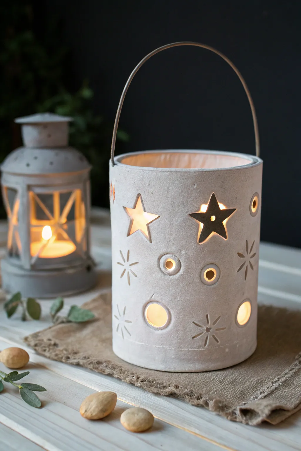 Soft pastel air dry clay lantern wrap with star cutouts, glowing gently for kid friendly craft fun