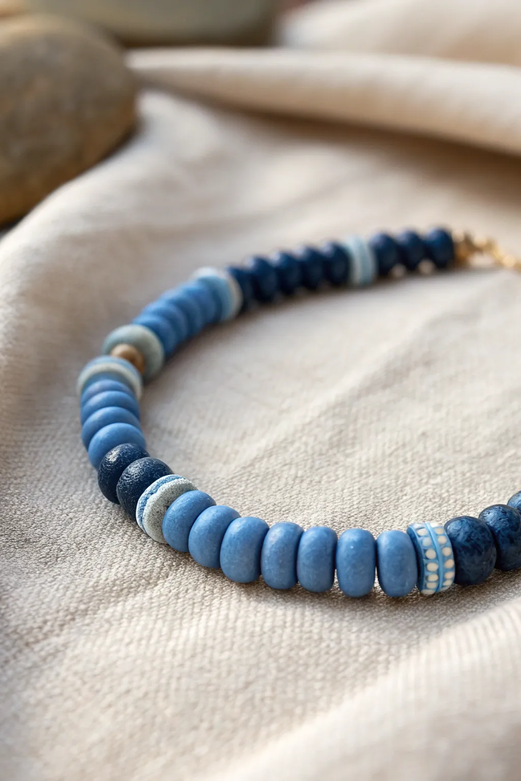 Alternating matte and glossy blues for a calm, modern clay bead bracelet with subtle shine.
