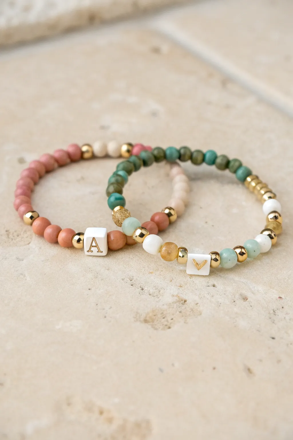 Minimal heishi clay bead bracelets with a single initial, a sweet handmade name bracelet gift.