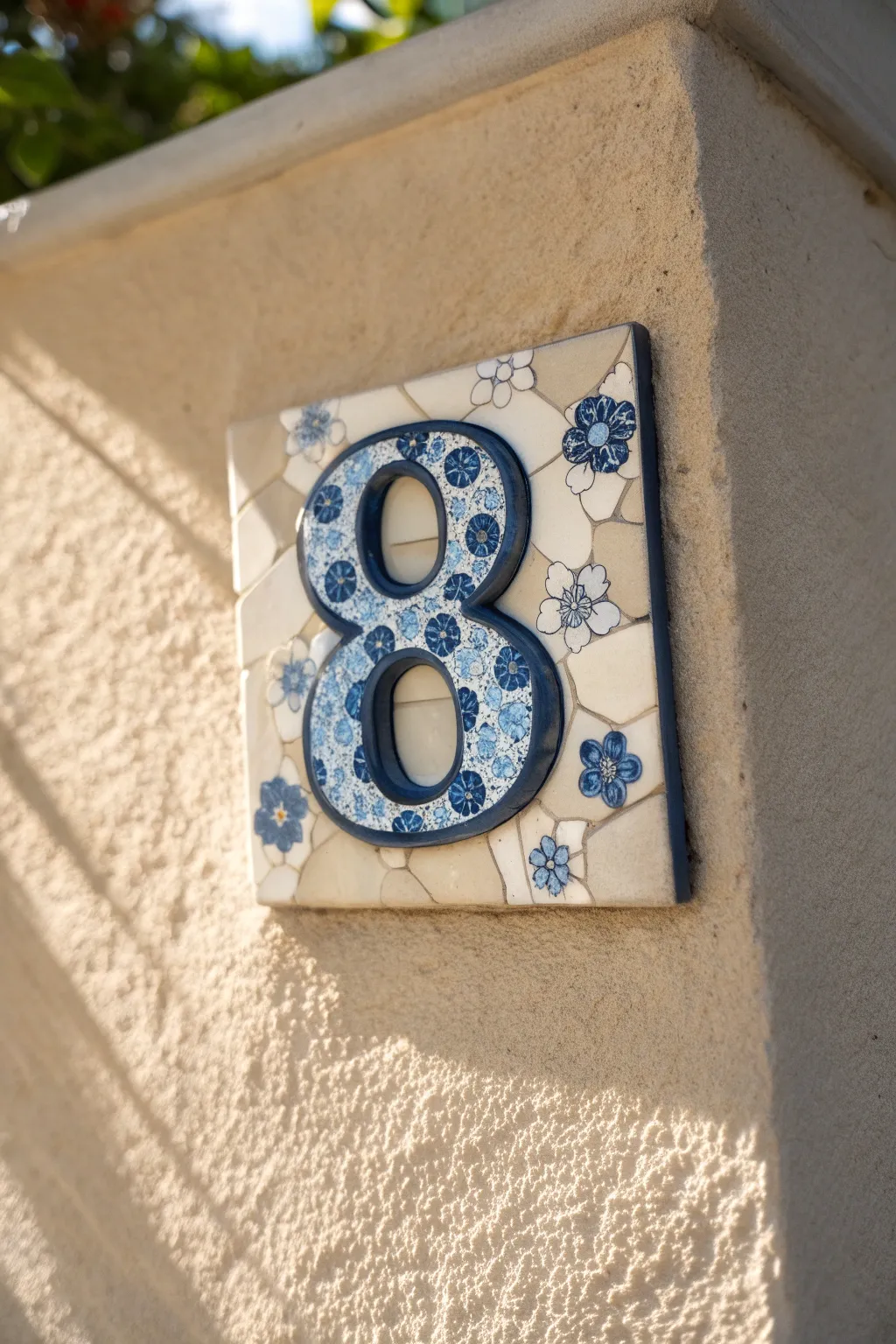 Elegant broken china house number plaque with bold charcoal grout for crisp, readable style