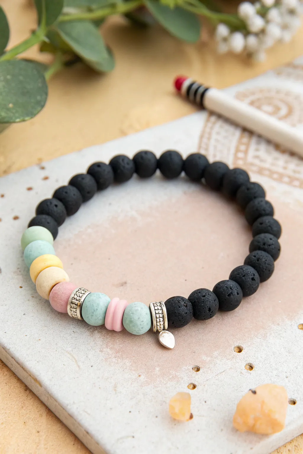 Chalkboard-inspired clay bead bracelet with pastel accents, a simple gift for favorite teachers